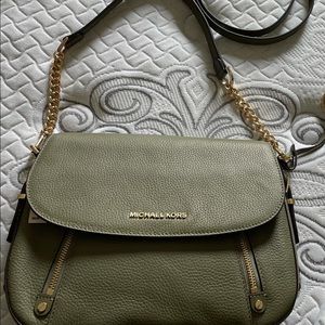 Michael Kors New with tags.  Two straps.